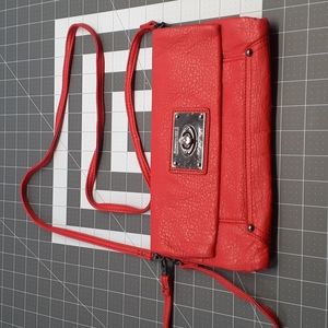 Kenneth Cole - Reaction Clutch